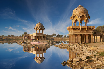 Wall Mural - Gadi Sagar temple on Gadisar lake Jaisalmer, India.