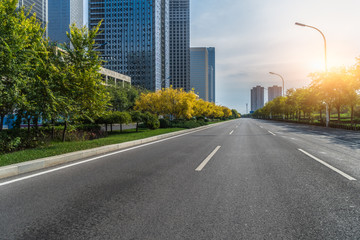 Wall Mural - city road through modern buildings in beijing.