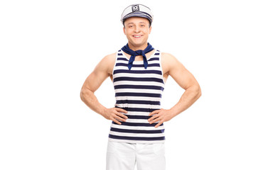 Wall Mural - Young man dressed in a sailor outfit