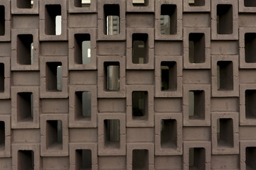 Block Wall With Reflection In The Background