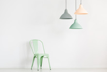 Pastel Lamps Above Mint Chair