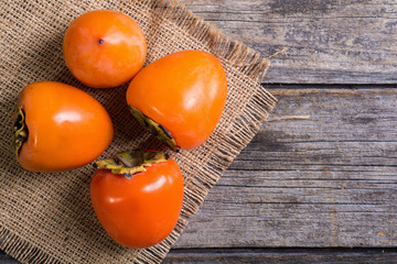 Wall Mural - Delicious ripe persimmon fruit