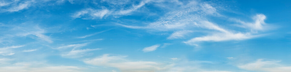 Poster - Vibrant color panoramic sky with cloud on a sunny day. Beautiful cirrus cloud. Panorama high resolution photograph.