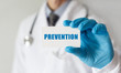 © MP Studio - Doctor holding a card with text PREVENTION,medical concept