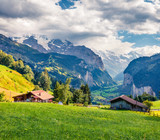 Fototapeta Krajobraz - Colorful summer view of Wengen village. Dramatic outdoor scene in Swiss Alps, Bernese Oberland in the canton of Bern, Switzerland, Europe. Artistic style post processed photo.