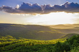 Fototapeta Mapy - Sunset at the hillside