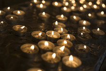 Many Candles Burn In The Church