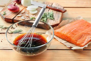Wall Mural - Soy marinade for salmon and fillet on wooden table