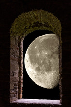 Moon Through Ancient Stone Window