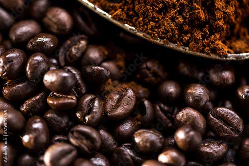 Fotografie, Obraz Coffee poured into an ancient antique silverware spoon