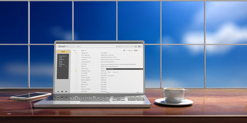 Emails on a laptop screen isolated on an office desk, blue sky background. 3d illustration