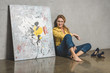 © LIGHTFIELD STUDIOS - woman sitting at painting