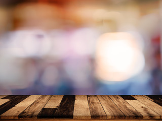 Sticker - wood table with blurred interior in cafe background