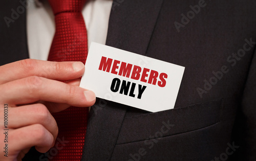 Photographie Businessman putting a card with text MEMBERS ONLY in the pocket