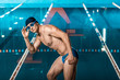 © LIGHTFIELD STUDIOS - swimmer posing at swimming pool
