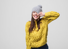 Beautiful Woman Winter Portrait. Smiling Girl Wearing Warm Clothes Having Fun