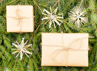 Gifts packaging inspiration. Natural design. Kraft paper, jute cord, pine twigs