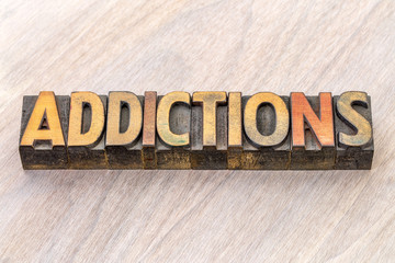 Wall Mural - addictions word abstract in wood type