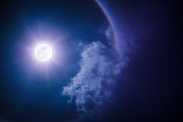 Wall Mural - moon halo phenomenon. nighttime sky and bright full moon with shiny.