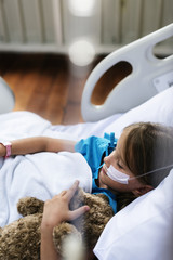 Wall Mural - Young Caucasian girl staying at a hospital