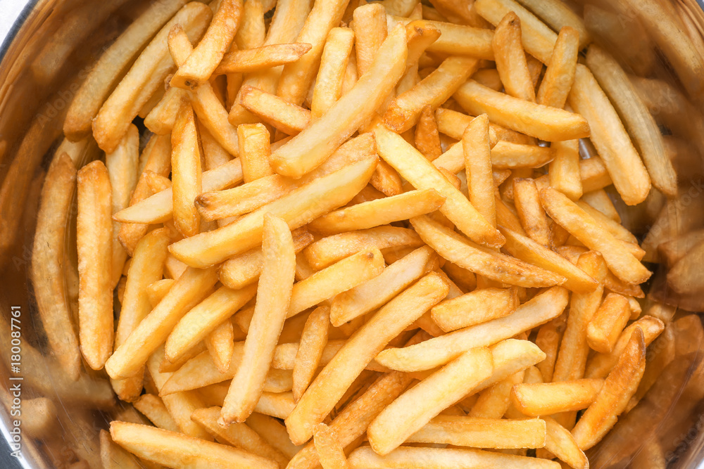 Bowl with yummy french fries, closeup