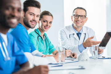 Wall Mural - team of doctors having conversation