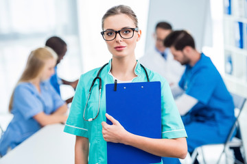 Wall Mural - nurse holding clipboard