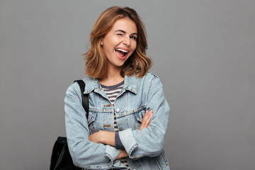 Wall Mural - Portrait of a cheerful pretty teenage girl