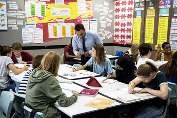 Wall Mural - group of students learning with their teacher