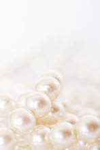 Pile Of Pearls On The White Background