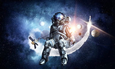 Wall Mural - space fantasy image with astronaut. mixed media