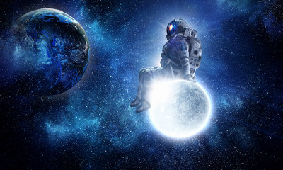 Wall Mural - astronaut sit on full moon. mixed media
