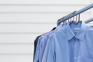 Housework of dry cleaning clothes man shirt