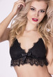 © Max - Sexy adult blonde model with red lips wearing lace black lingerie.
