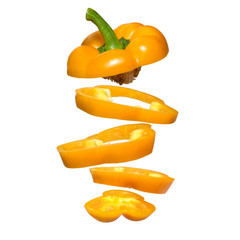 Creative concept with flying yellow paprika. Sliced floating pepper isolated. Levity vegetable. Capsicum