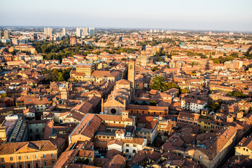 Aerial view of Bologna, Italy at sunset. Colorful sky over the historical city center and old buildings