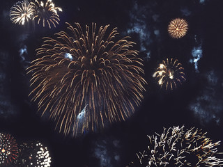 Festive Gold Fireworks Collage in Night Sky for New Years and Independence Day Celebrations