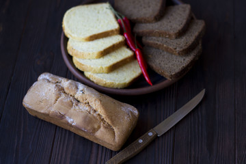 Cake, bread and spices in an earthenware dish on the table. Healthy fresh food.