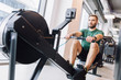 © Photocreo Bednarek - Active athlete man doing rowing workout