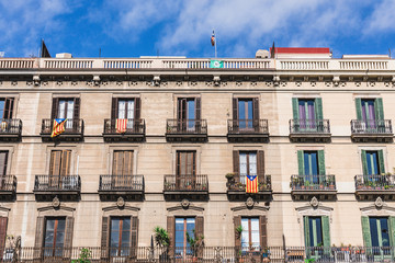 Wall Mural - Si Signs and Estelada Flags in Windows