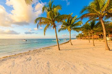 Sunrise at Akumal beach, paradise bay at Riviera Maya, caribbean coast of Mexico