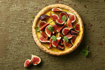 Wall Mural - Fruit tart top view on wood background