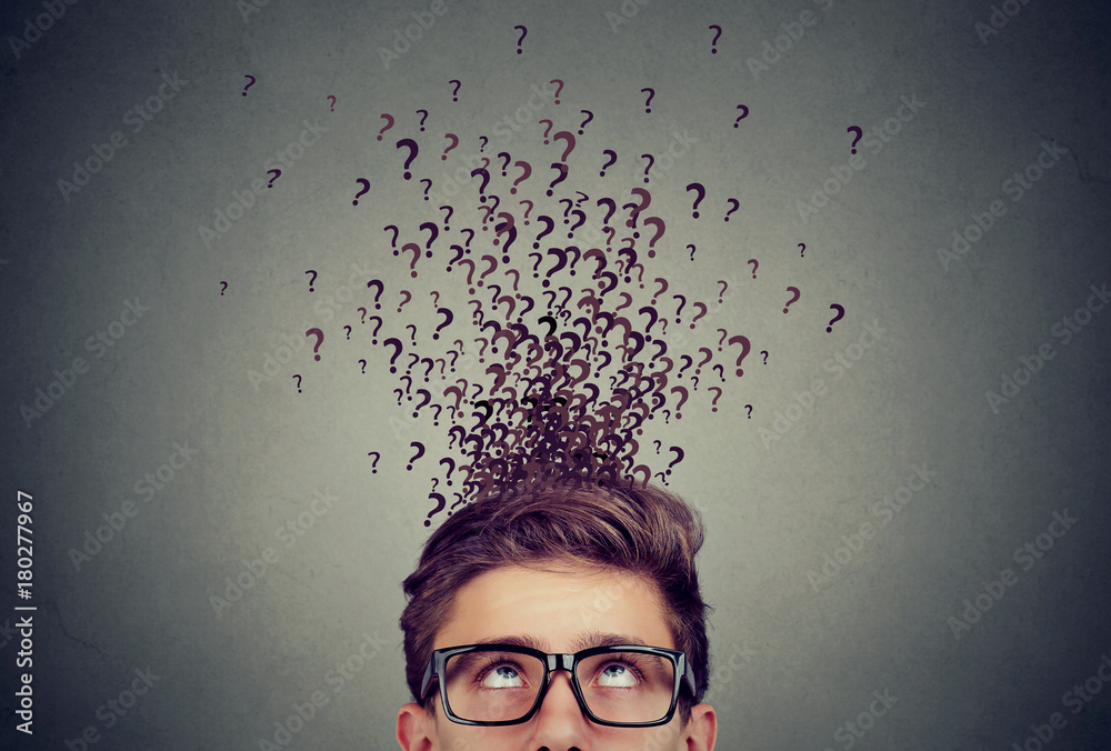 To Much Questions Young man with too many questions and no answer Stock Photo | Adobe Stock