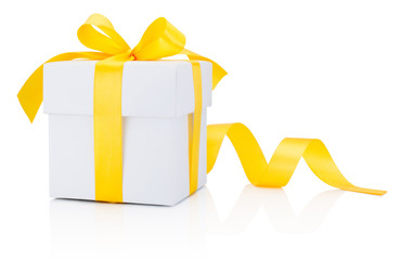 Wall Mural - White gift box tied yellow ribbon bow Isolated on white background