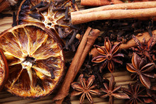 Dry Orange Slices, Cinnamon Sticks, Anise And Clove Christmas Spices Decoration.