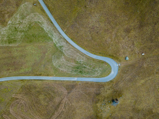 Sticker - Aerial view of road bend in mountain area