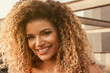 © patronestaff - Beautiful happy woman closeup portrait with gorgeous curly hair