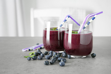 Wall Mural - Glasses with acai juice on table