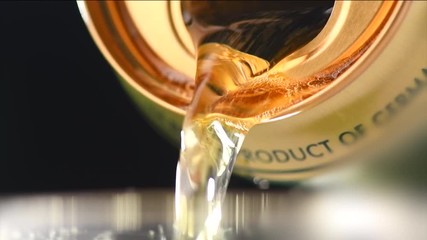 Wall Mural - Beer pouring from a can into a glass. Slow motion. 4K video 3840x2160