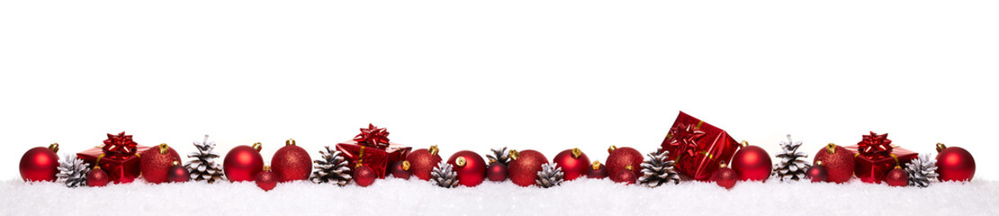 red christmas balls with xmas present gift boxes in a row isolated on snow, christmas banner